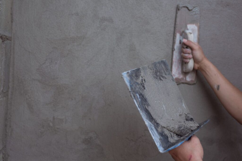 plasterer renovating indoor walls